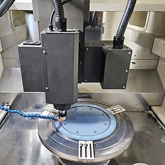 Multi-axis polishing of round component